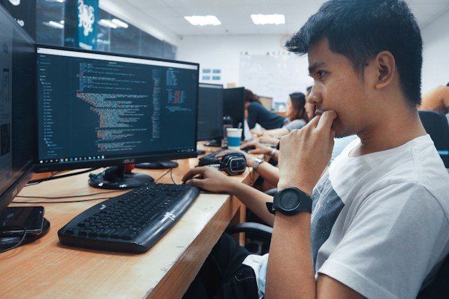 Student learning computer programming